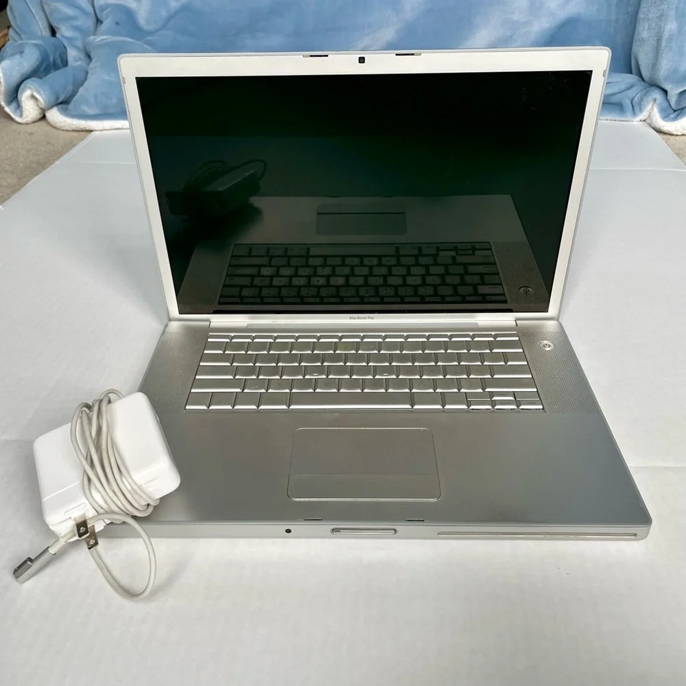 Working Apple MacBook Pro 15” laptop with adapter, 2.16 GHz Intel Core 2 Duo